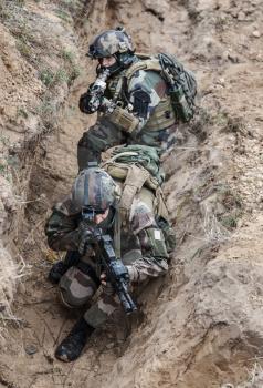 Paratroopers of french 1st Marine Infantry Parachute Regiment RPIMA in entrenchments