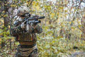 United states Marine Corps special operations command Marine Special Operator also known as Marsoc raider wearing camouflage uniforms in the forest