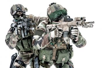 Paratroopers of french 1st Marine Infantry Parachute Regiment RPIMA studio shot firing pointing weapons
