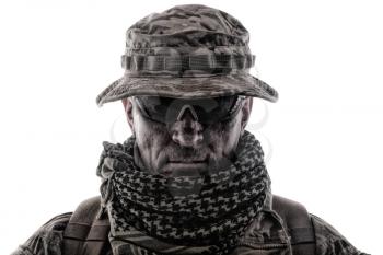 Shoulder portrait of skilled commando fighter, army forces veteran, professional military mercenary, experienced soldier in camo bonnie, glasses and shemagh studio shoot isolated on white background