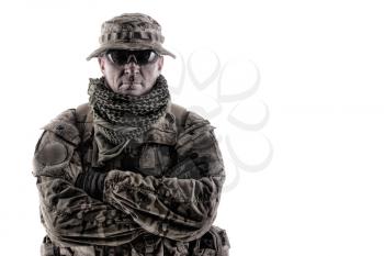 Shoulder portrait of skilled commando fighter, army forces veteran, professional military mercenary, experienced soldier in camo bonnie, glasses and shemagh studio shoot isolated on white background
