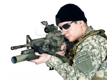 US soldier aiming with his assault rifle