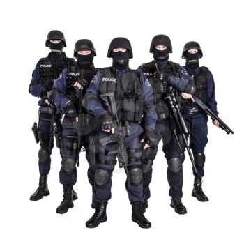 Special weapons and tactics (SWAT) team officers with guns