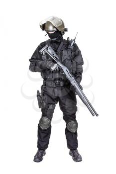 Spec ops soldier in black uniform and face mask with shotgun