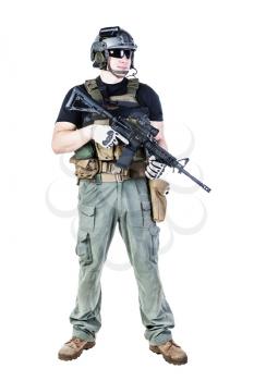 Studio shot of private military contractor PMC with assault rifle