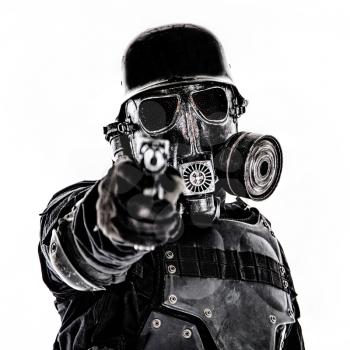 Futuristic nazi soldier gas mask and steel helmet with luger pistol handgun isolated on white studio shot