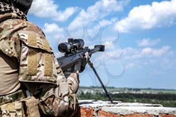 US Army ranger sniper with huge rifle