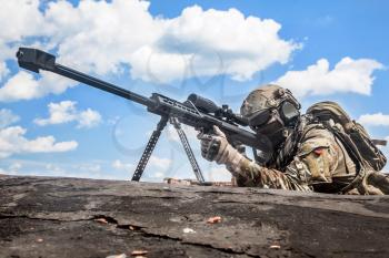 US Army ranger sniper with huge rifle