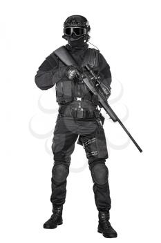 Studio shot of swat operator with sniper rifle. Tactical helmet gloves, eyewear telescopic sight. Security forces concept, full body portrait