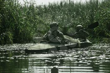 Special forces operators in the military kayak