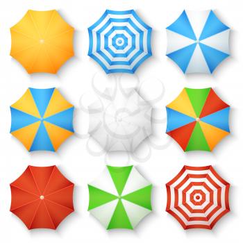Beach sun umbrellas top view vector icons. Set of parasol with colored striped pattern illustration