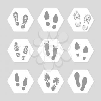 Grey footprints icons - female, male and sport shoe. Vector illustration