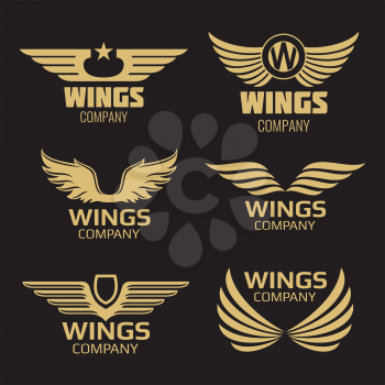 Vector golden wings logo on black backdrop. Collection of wings. Vector illustration