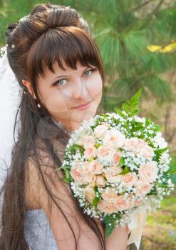 Portrait beautiful bride outdoors
