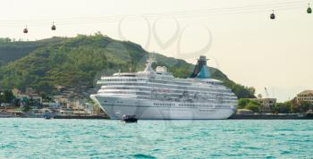 Big, white cruise ship in port