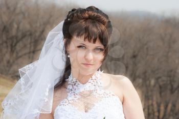 Portrait beautiful bride outdoors in a forest
