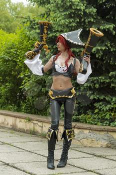 Lviv, Ukraine - May 23,2015: Woman  dressed in the costume of the piraten  performs  at the festival cosplay Anicon in Lviv May 23.2015