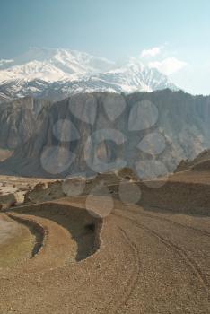 Tibetan field and mountain's landscape. Tibet, Nepal.