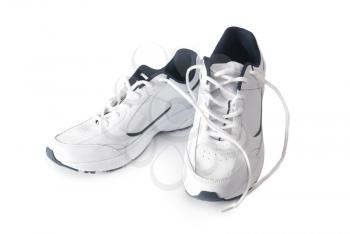Pair white of trainers on isolated background