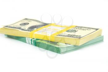 Stack of money- cash of US dollars and euros isolated on white background