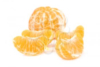 Orange peeled mandarin and slices without skin isolated on white background