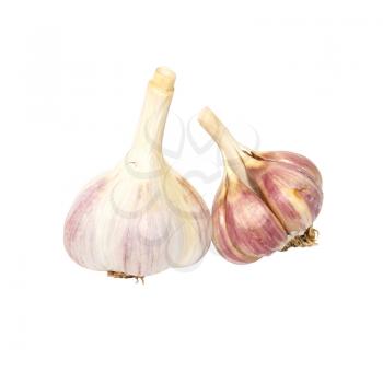 Two garlic cloves isolated on white.