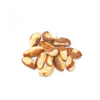 Heap of brazil nuts isolated on white.