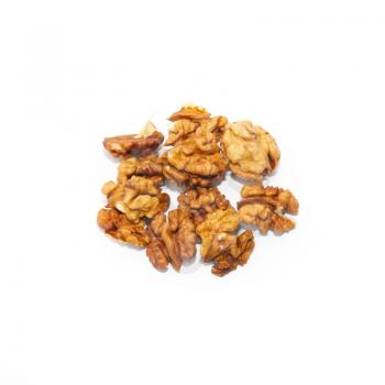 Heap of walnuts isolated on white.