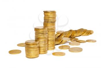 Columns of golden coins isolated on white.