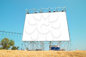 Empty billboard with the blue sky background