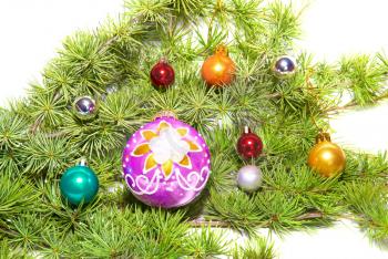 Christmas baubles, fir tree and decoration isolated on white