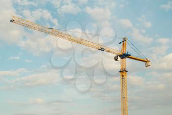 Building crane with blue sky background