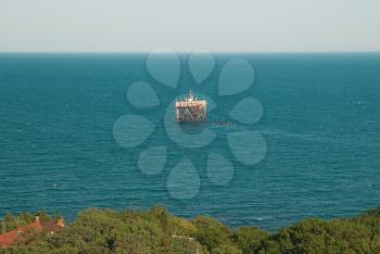 Oil platform in the sea near shore