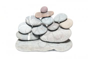 Wall of gray pebbles isolated on white 