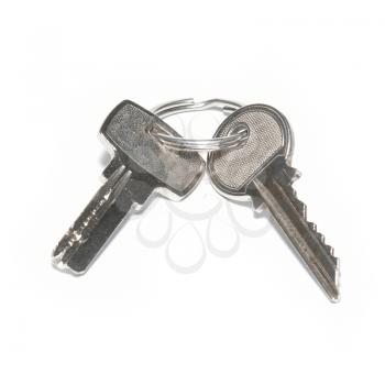 Two silver keys isolated on white background