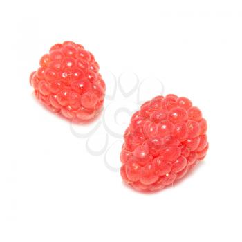 Two raspberries isolated on the white background