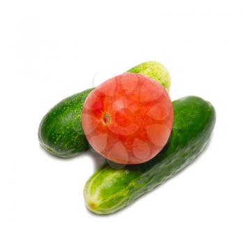 Cucumbers and red tomato isolated on white.