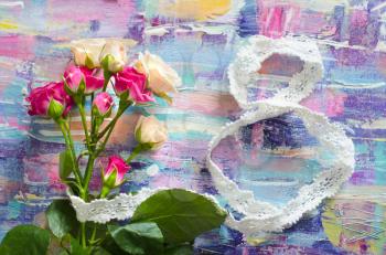 Miniature roses on a beautiful background. Texture of acrylic painting. Festive photocomposition.