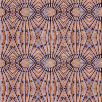 Ornate wooden seamless pattern with metal elements. Relief wooden geometrical ornament in the form of the sun with rays.