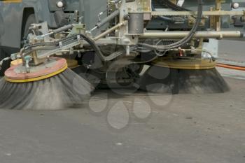 Brushes of the cleaner machine. Cleaning on the road. Clean roads