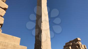 Buildings and columns of ancient Egyptian megaliths. Ancient ruins of Egyptian buildings