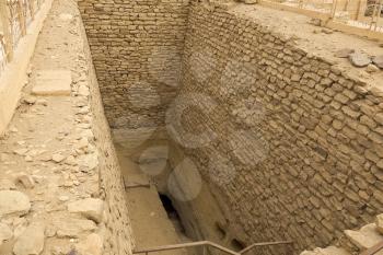 Underground entrance near the pyramid. Ancient buildings. Big pyramids of Egypt.
