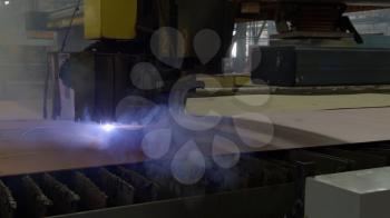 Novorossiysk, Russia - May 26, 2018: Automatic laser welding machine at the shipyard. Shipbuilding plant, Internal welding workshop m erection of metal structures. The plant in Novorossiysk.