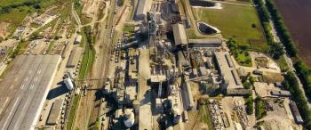 Panorama of the cement plant. Large cement plant. The production of cement on an industrial scale in the factory.