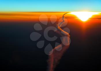 Condensation trail left by the aircraft during the flight.