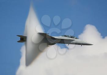 The fighter overcomes the sound barrier, the moment of transition of the sound barrier by plane.