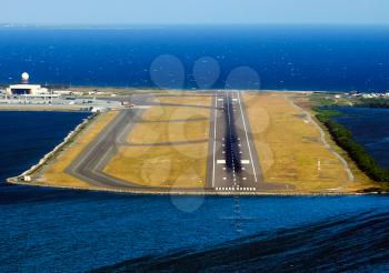 Airport on the island, landing strip on the island.