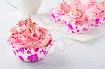 Pink delicious cupcakes.Selective focus. Birthday cupcakes. Homemade cupcake. Sweet cupcake. Gourmet cupcakes. Sweet dessert. Sweet pastry. 