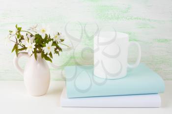Coffee mug mockup with spring flowers. Empty mug mockup for product presentation. Coffee cup mockup for promotion brand or design. 