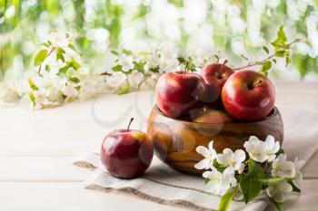 Ripe apples in wooden bowl. Healthy food. Healthy eating. Vegetarian food. Healthy eating concept. Fresh fruits. Fresh apples.